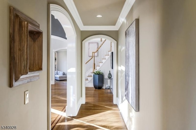 35 Geiger Ln, Warren Twp, NJ 07059 - entryway featuring ornamental molding, arched walkways, wood finished floors, stairway, and baseboards