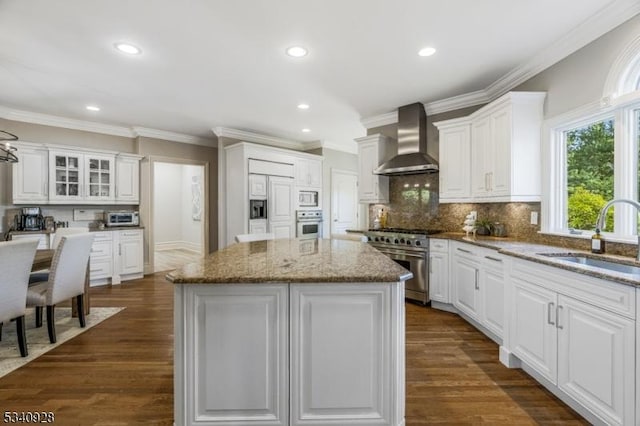 35 Geiger Ln, Warren Twp, NJ 07059 - kitchen with wall chimney range hood, a sink, built in appliances, a center island, and recessed lighting