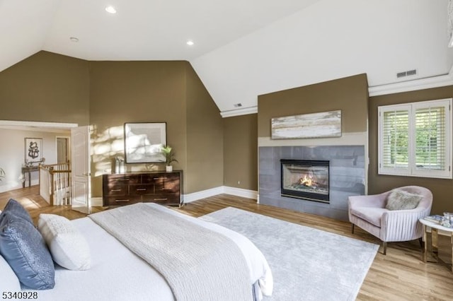35 Geiger Ln, Warren Twp, NJ 07059 - bedroom with lofted ceiling, wood finished floors, a fireplace, baseboards, and recessed lighting