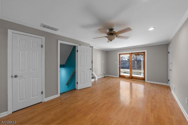 unfurnished bedroom with light wood-style floors, access to outside, visible vents, and baseboards