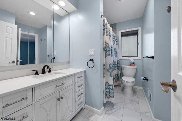 full bathroom featuring toilet, marble finish floor, baseboards, and vanity