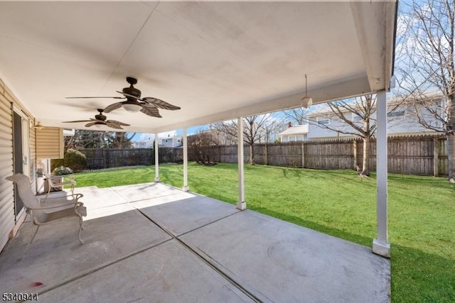 view of patio with ceiling fan and a fenced backyard