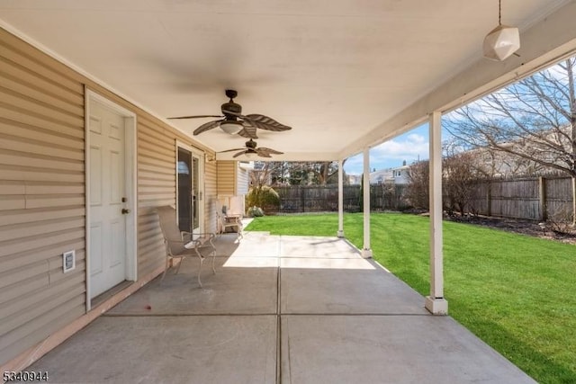 view of patio / terrace with a fenced backyard and a ceiling fan