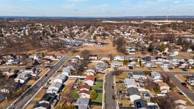 birds eye view of property with a residential view