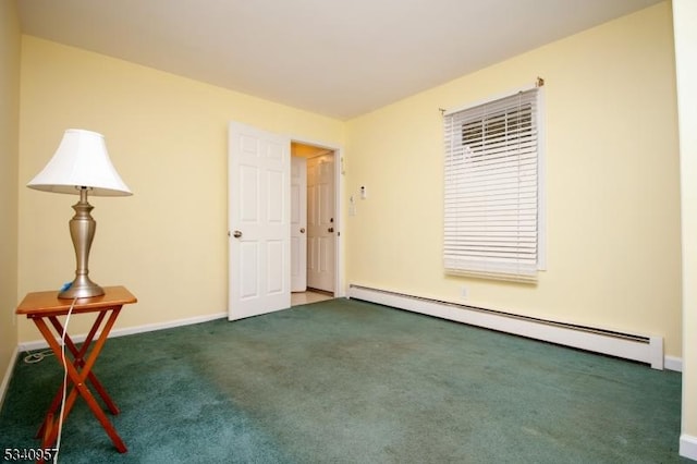 carpeted empty room featuring baseboards and a baseboard heating unit