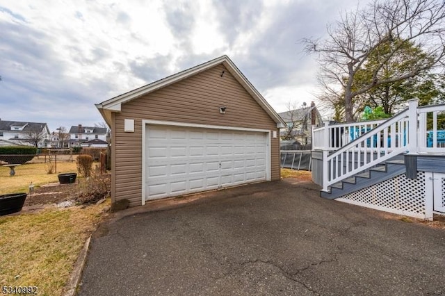 detached garage with fence