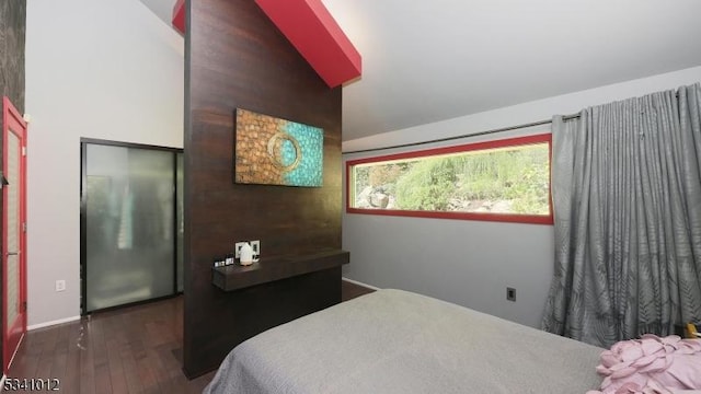 bedroom with wood-type flooring