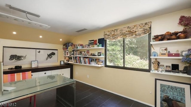 office space with lofted ceiling, visible vents, and recessed lighting