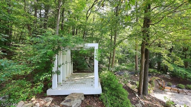 exterior space featuring a view of trees