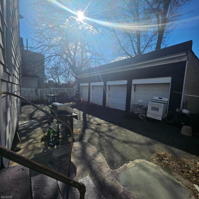 garage featuring fence