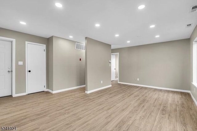 interior space featuring recessed lighting, visible vents, and light wood finished floors