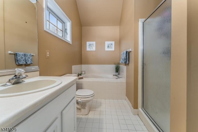 bathroom with a stall shower, a garden tub, vanity, and tile patterned floors