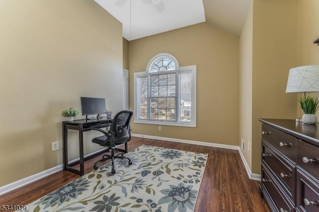 office with dark wood-style floors, baseboards, and vaulted ceiling