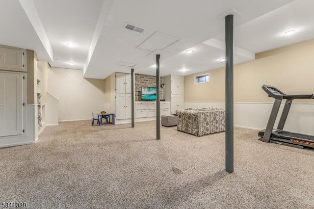 basement featuring carpet and visible vents