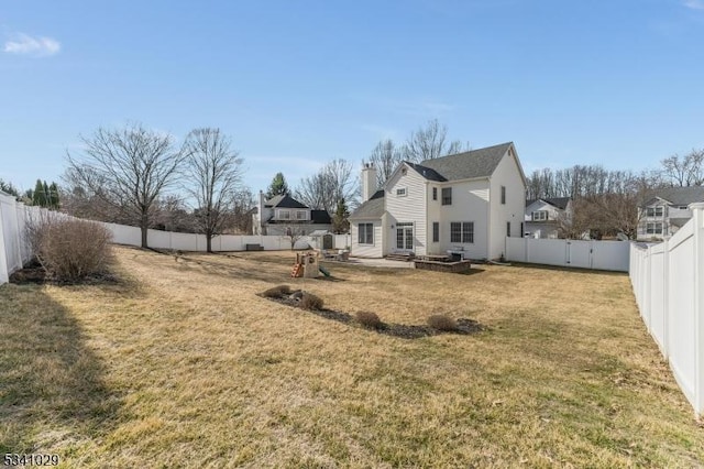 view of yard featuring a fenced backyard and a patio