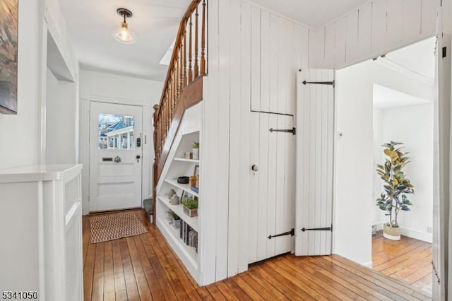 mudroom with hardwood / wood-style floors