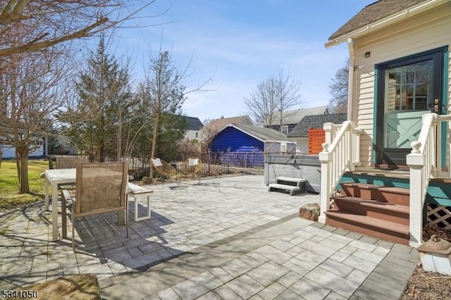 view of patio / terrace with outdoor dining area and fence