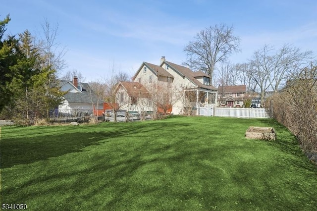 view of yard featuring fence