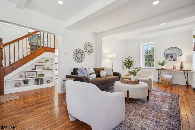 living room with beam ceiling, stairway, recessed lighting, and wood-type flooring