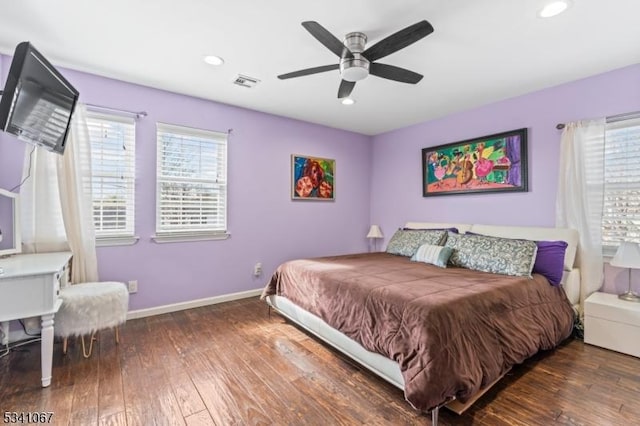 bedroom with recessed lighting, wood-type flooring, visible vents, a ceiling fan, and baseboards