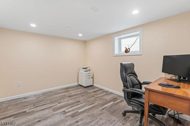 home office with baseboards, wood finished floors, and recessed lighting