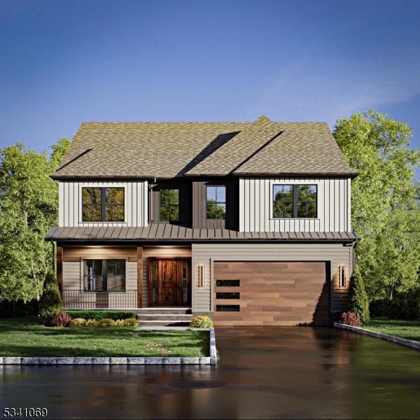 view of front of home featuring board and batten siding, an attached garage, a porch, and concrete driveway