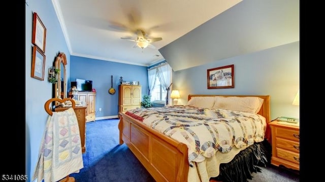 bedroom featuring baseboards, dark colored carpet, a ceiling fan, and crown molding