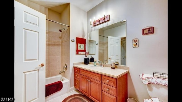 bathroom with shower / tub combination and vanity