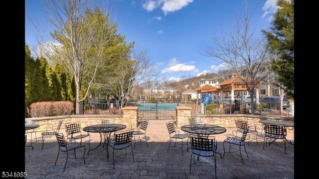 view of patio / terrace with fence