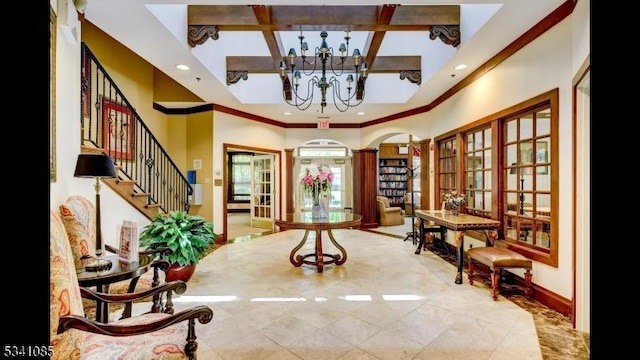 living area with crown molding, recessed lighting, stairway, a chandelier, and coffered ceiling