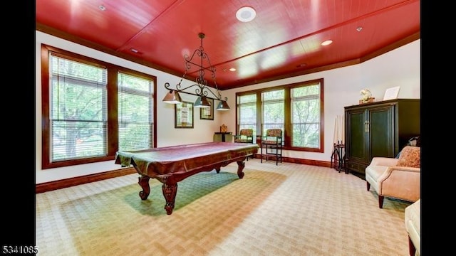 recreation room featuring billiards, baseboards, wooden ceiling, ornamental molding, and carpet