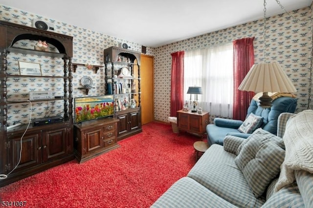 carpeted living room with wallpapered walls