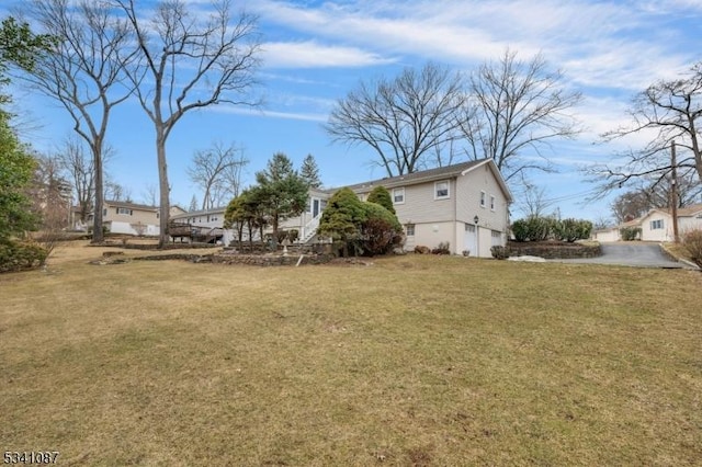 view of yard with a garage