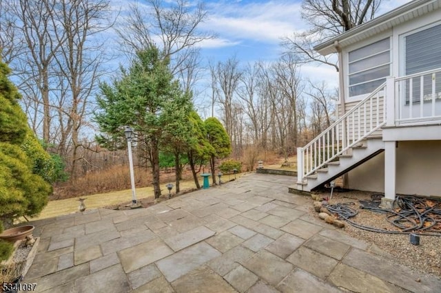 view of patio with stairs