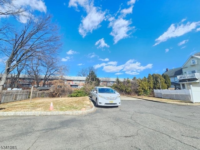 view of street with curbs