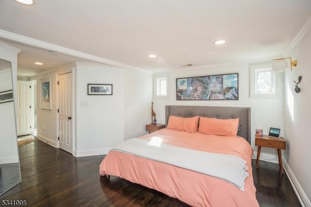 bedroom featuring ornamental molding, recessed lighting, baseboards, and wood finished floors