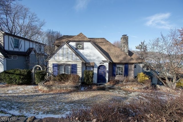 tudor home with a chimney