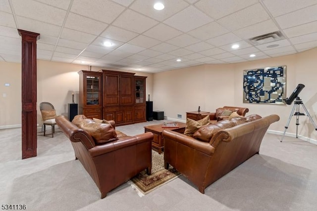 living room with light carpet, baseboards, visible vents, and ornate columns