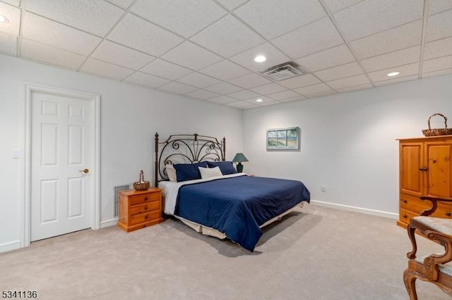 bedroom with light carpet, baseboards, visible vents, a paneled ceiling, and recessed lighting