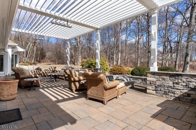 view of patio with an outdoor hangout area and a pergola