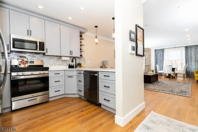 kitchen featuring stainless steel appliances, ornamental molding, light wood-type flooring, decorative backsplash, and open shelves