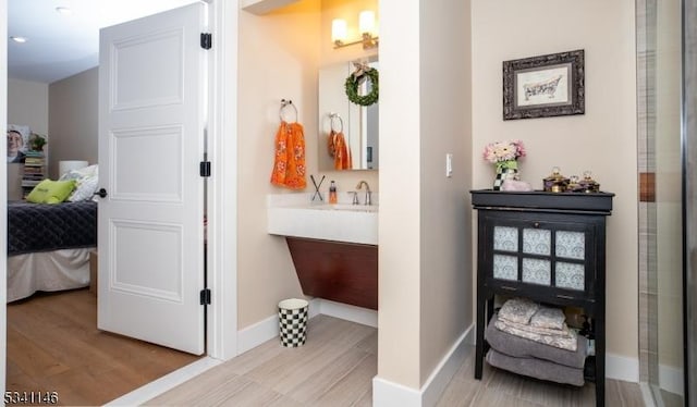 interior space with light wood-style flooring and baseboards