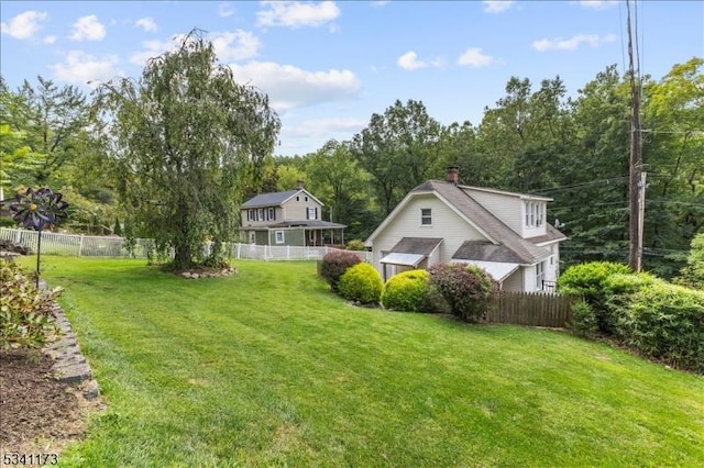 view of yard with fence