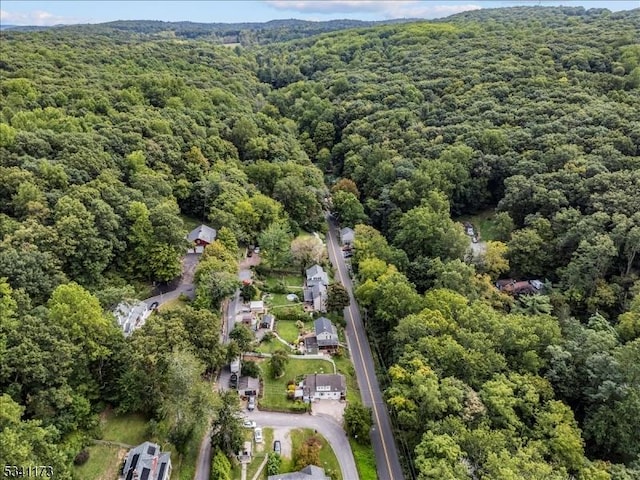 drone / aerial view with a forest view