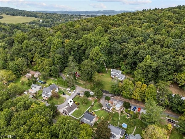 aerial view featuring a view of trees