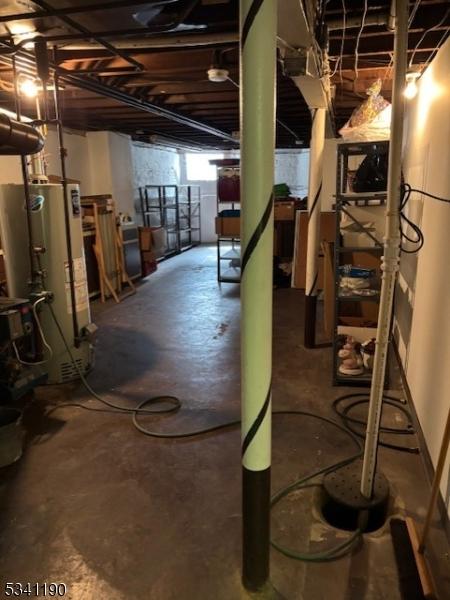 basement featuring gas water heater