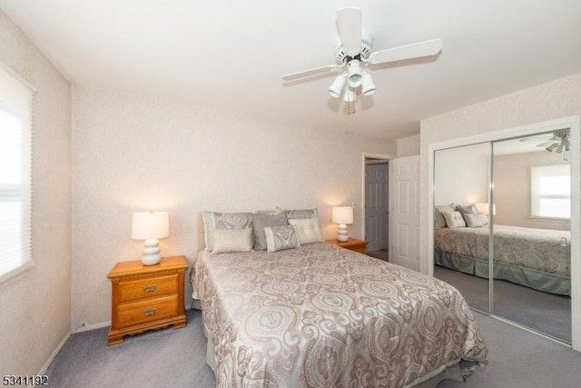 bedroom featuring a closet, carpet, a ceiling fan, and baseboards