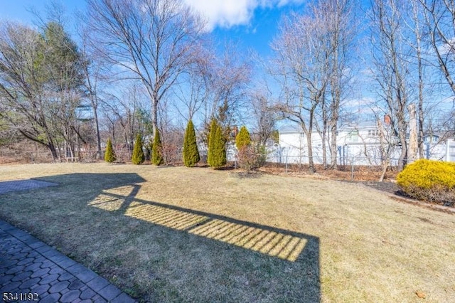 view of yard featuring fence