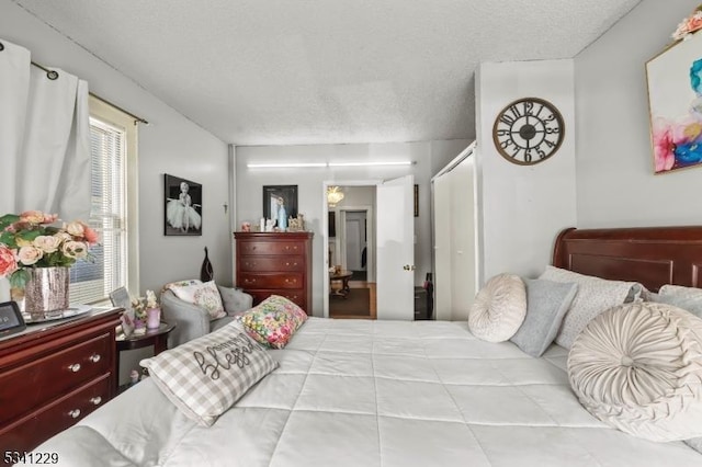 bedroom featuring a textured ceiling