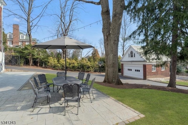 view of patio / terrace with a garage